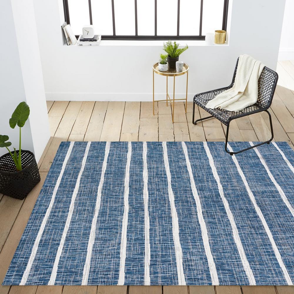 8' x 10' Blue and Ivory Synthetic Stripe Area Rug