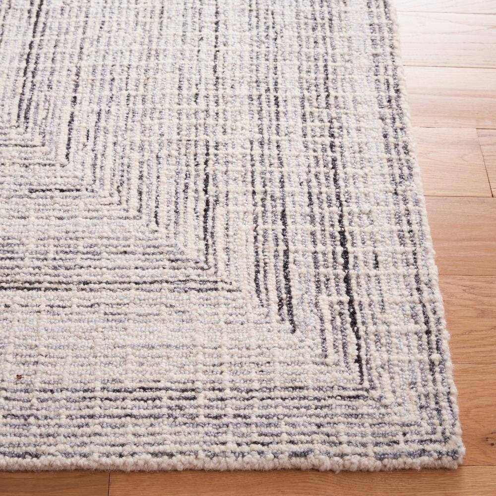 Handmade Tufted Wool Abstract Area Rug - Black/Ivory 9' x 12'