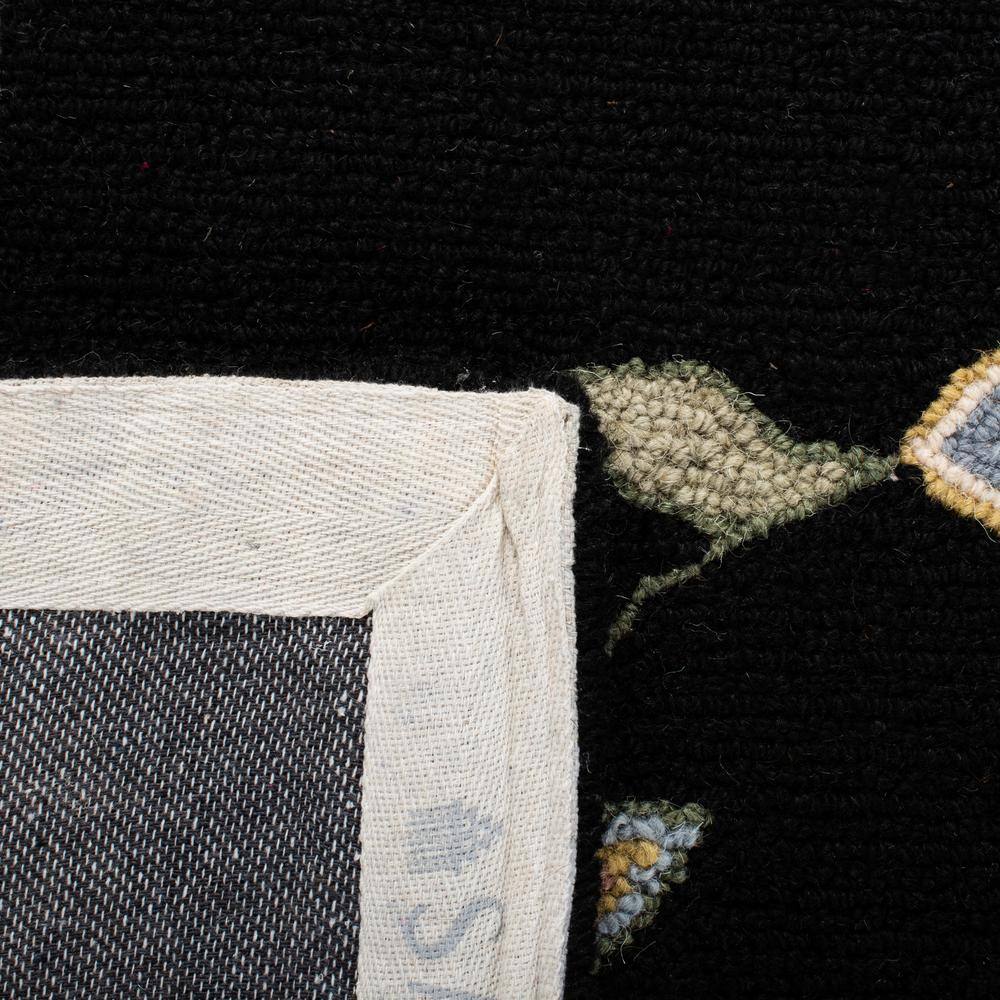 Elegant Floral Black Wool Hand-Knotted Area Rug - 2'9" x 4'9"
