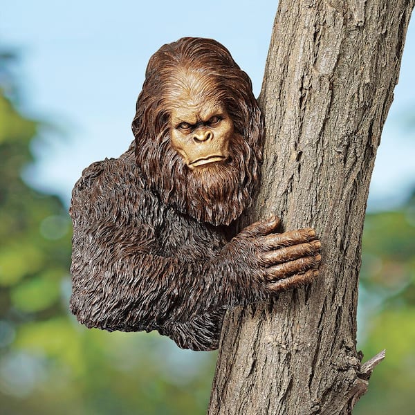 That's Forest, left, a gigantic Bigfoot figure at the Bigfoot