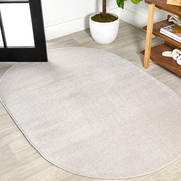 Haze Solid Low-Pile Ivory 5 ft. x 8 ft. Oval Area Rug