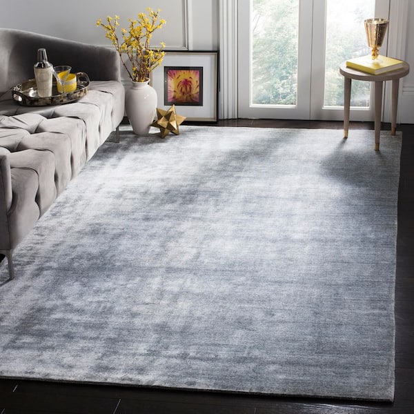 Mirage 6 ft. x 9 ft. Light Gray Solid Color Distressed Area Rug