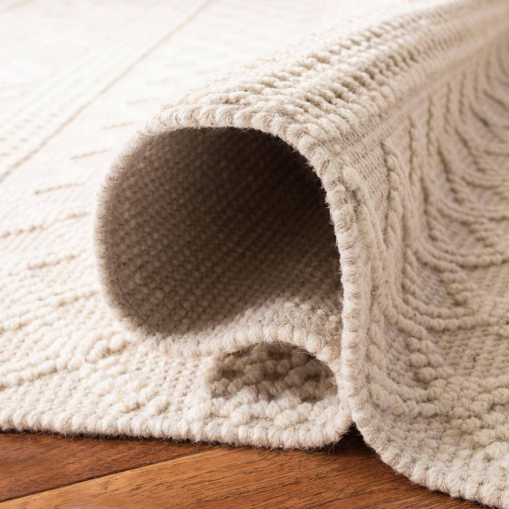 Elegant Ivory 9' x 12' Hand-Knotted Wool Area Rug