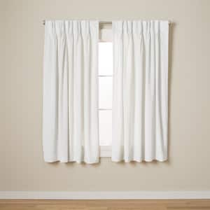 Velvet Winter White Solid Room Darkening 27 in. W x 63 in. Pinch Pleat Top Curtain Panel (2 Panels)