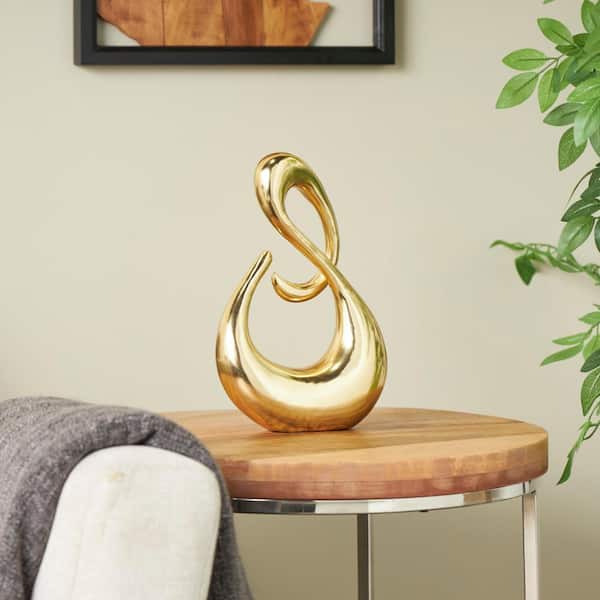 Litton Lane 12 in. Gold Aluminum Swirl Abstract Sculpture