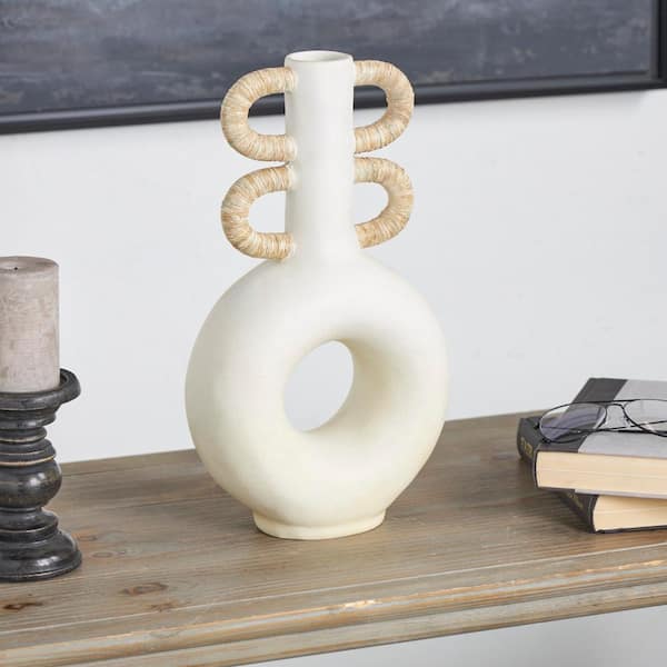 Litton Lane Cream Round Speckled Resin Decorative Vase with Woven Inspired Arched Handles and Cutout Opening