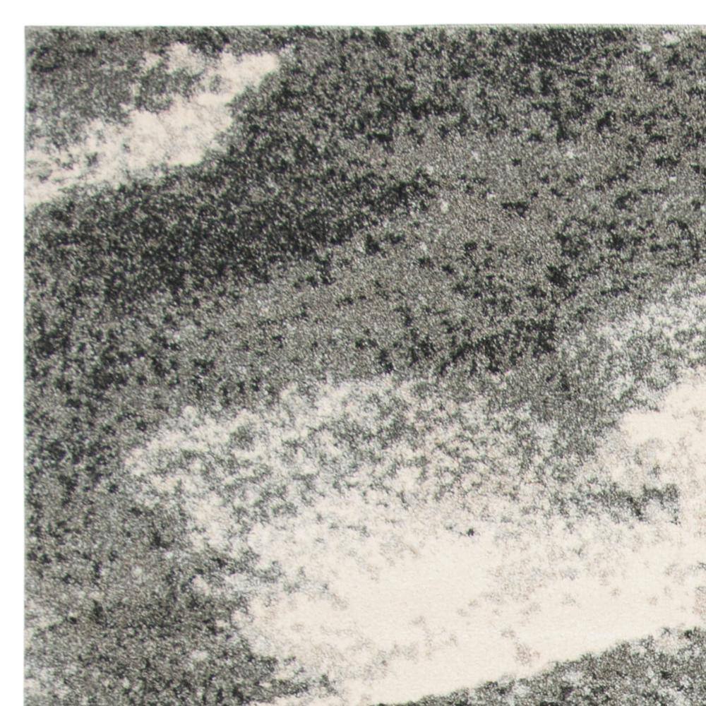 Grey and Ivory Abstract Synthetic Area Rug