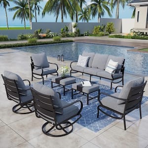 Black Slatted 9-Seat 7-Piece Metal Outdoor Patio Conversation Set with Gray Cushions, 2 Swivel Chairs, 2 Ottomans