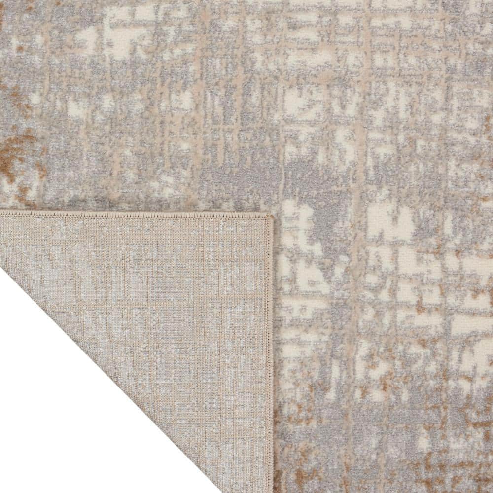 Ivory and Taupe Abstract Rectangular Synthetic Rug, 3'2" x 5'