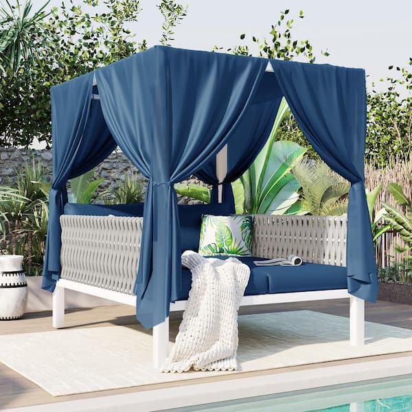 Harper & Bright Designs White Metal and Rubber Core Rope Outdoor Day Bed with Blue Curtains and Blue Cushions