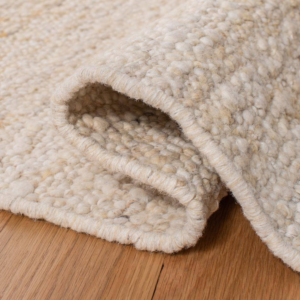 Ivory Handwoven Wool Rectangular Area Rug 5' x 8'