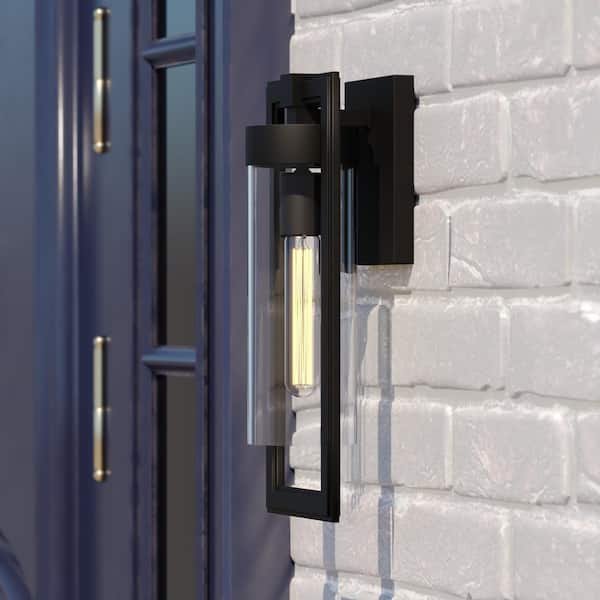VAXCEL Matte Black Malmo 1-Light Dusk to Dawn Contemporary Outdoor Wall Lantern Clear Cylinder Glass