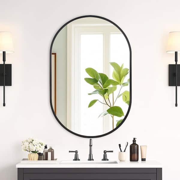 24 in. W x 36 in. H Modern Oval Metal Framed Wall Mounted Bathroom Vanity Mirror in Black