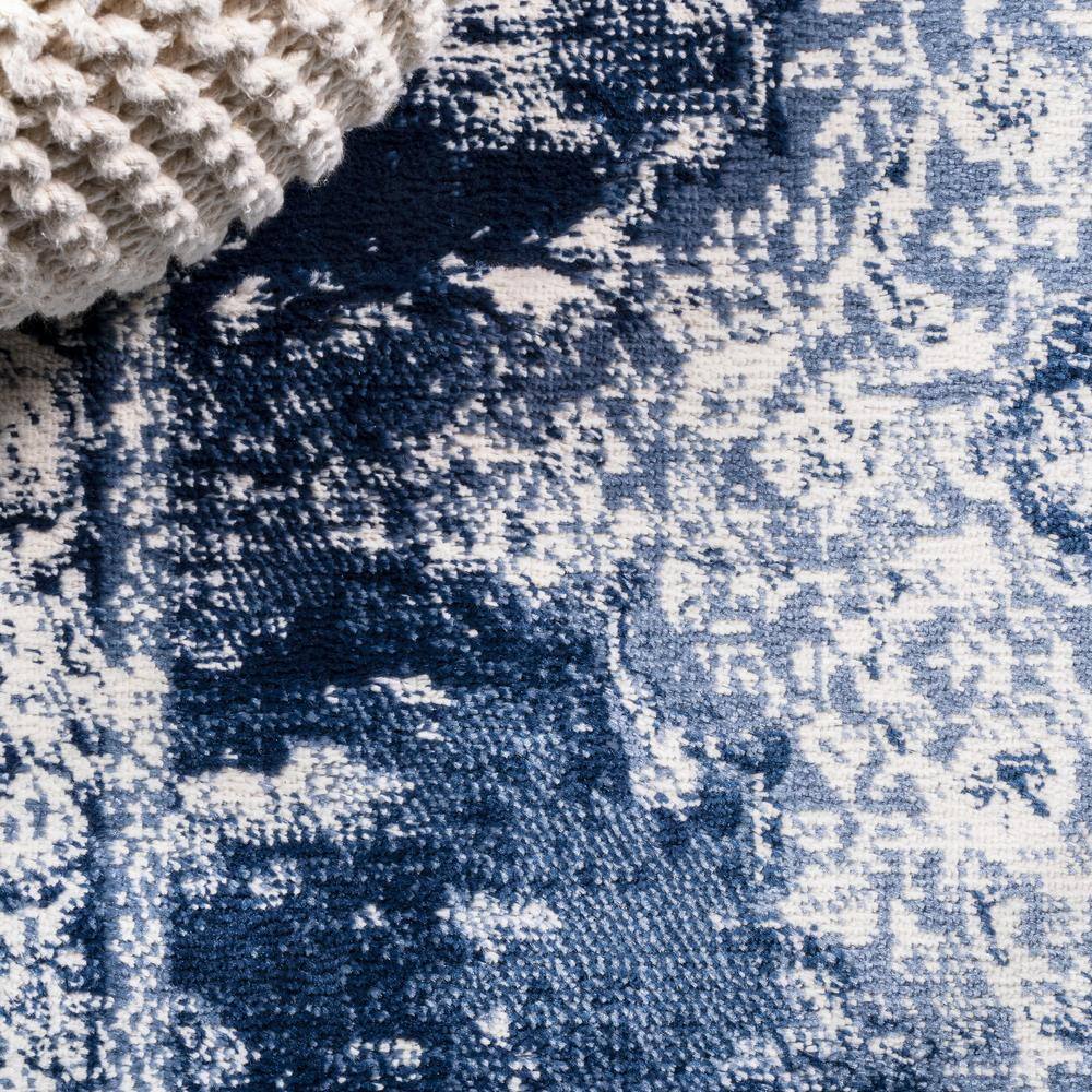 Navy and Ivory Synthetic Medallion 4' x 6' Area Rug