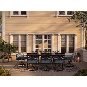 Montclair 9-Piece Steel Outdoor Dining Set with Navy Blue Cushions, 8 Swivel Rockers and 42 in. x 84 in. Table