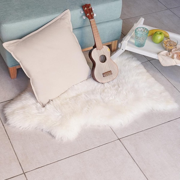Unshorn Sheepskin White Doormat 2 ft. x 3 ft. Animal Shape Area Rug