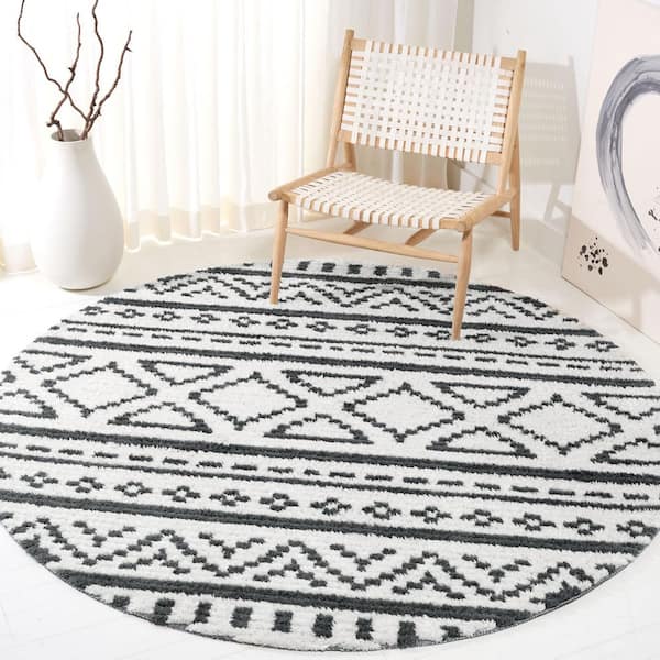 Burko 7 ft. x 7 ft. Ivory/Black Geometric Flokati Round Area Rug