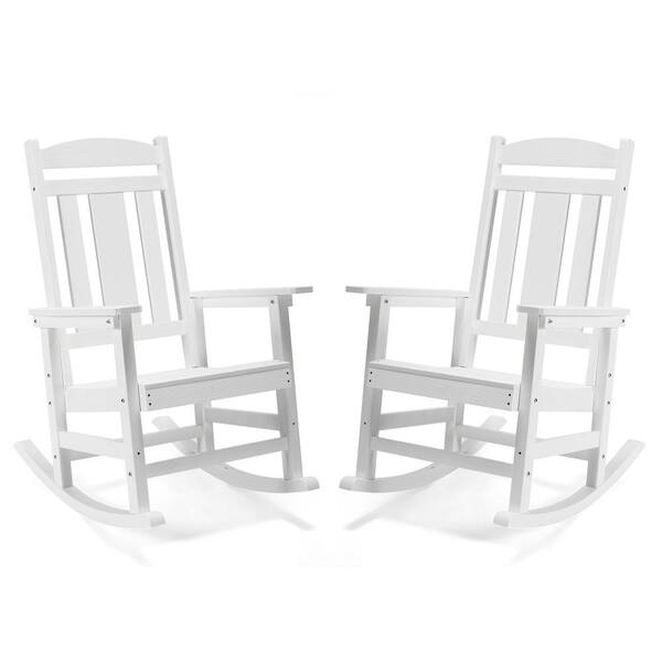 White plastic outdoor store rocking chairs