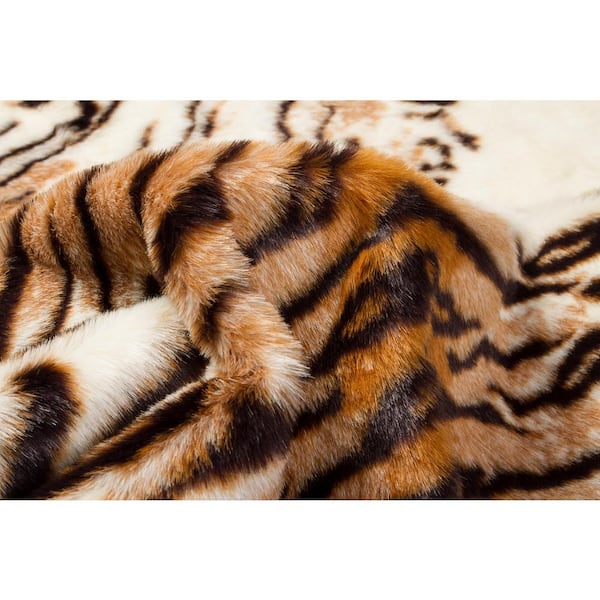 https://images.thdstatic.com/productImages/2f491101-ad44-425a-8a89-a44727cef8ec/svn/tiger-luxe-l-100-faux-fur-area-rugs-676685030146-c3_600.jpg