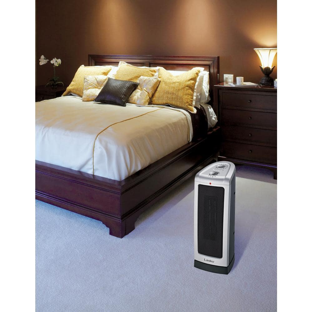 Lasko 5307 Tower 16 in. 1500-Watt Electric Ceramic Oscillating Tower Space Heater with Manual Thermostat
