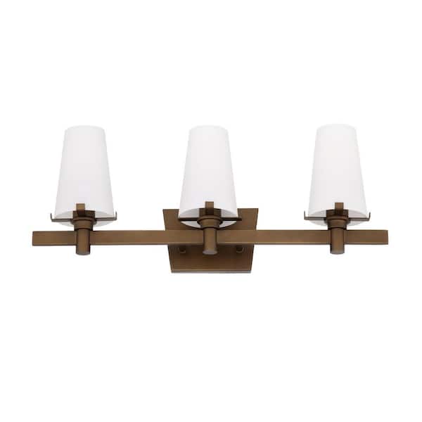 Designers Fountain Hyde Park 24 in. 3-Light Vintage Gold Modern Vanity with Opal Glass Shades