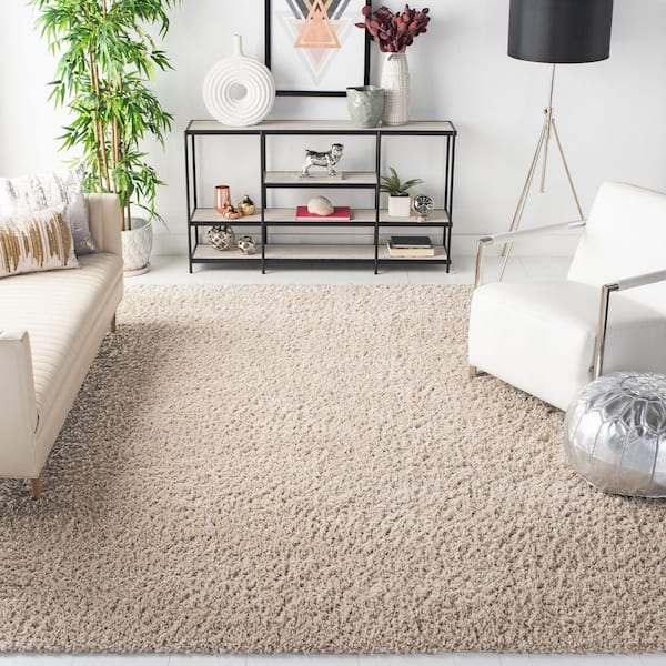August Shag 9 ft. x 12 ft. Beige Solid Area Rug