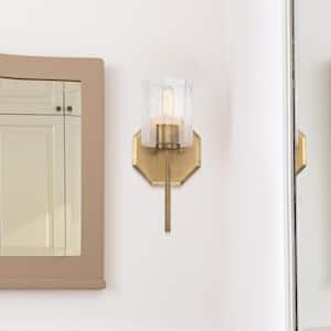 Haven 7 in. 1-Light Old Satin Brass Wall Sconce Light with Clear Rippled Glass Shades for Bathrooms