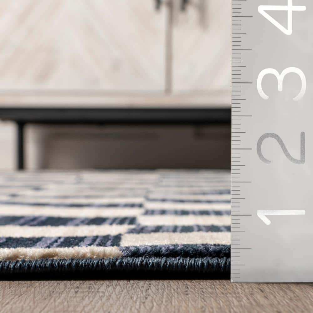 Navy and Beige Geometric Synthetic 8' x 10' Area Rug