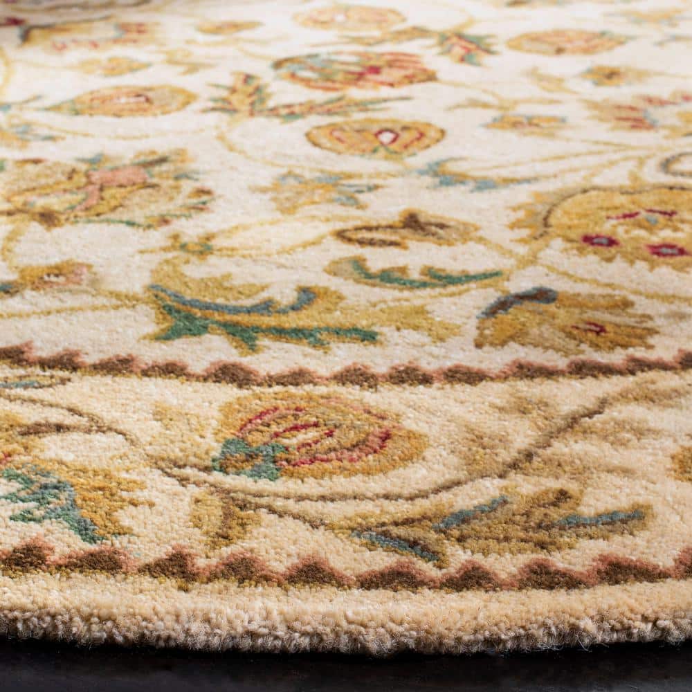 Handmade Ivory Wool Tufted 6' Round Rug