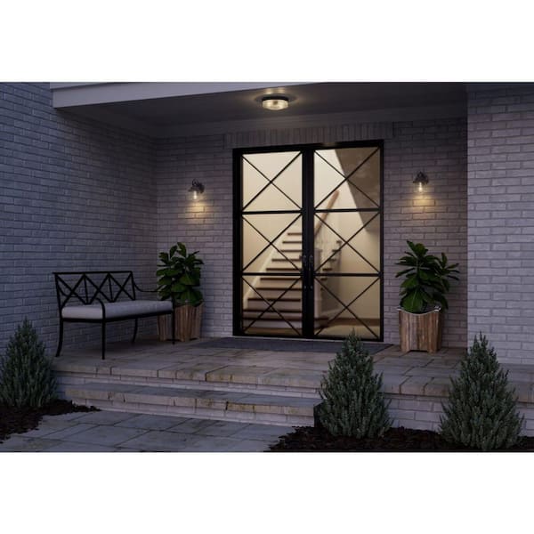 Weldon Collection 1-Light Textured Black Clear Seeded Glass Farmhouse Outdoor Small Wall Lantern Light