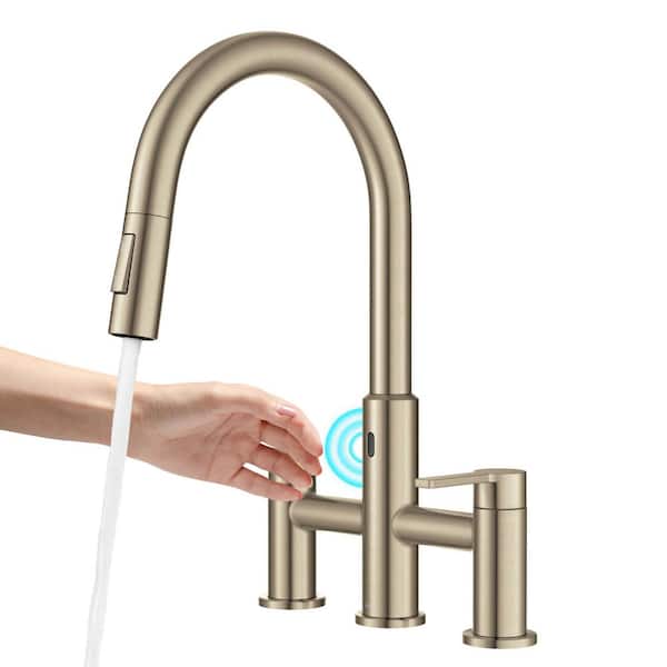 KRAUS Oletto Touchless Double Handle Bridge Kitchen Faucet with Pull-Down Sprayhead in Spot-Free Antique Champagne Bronze