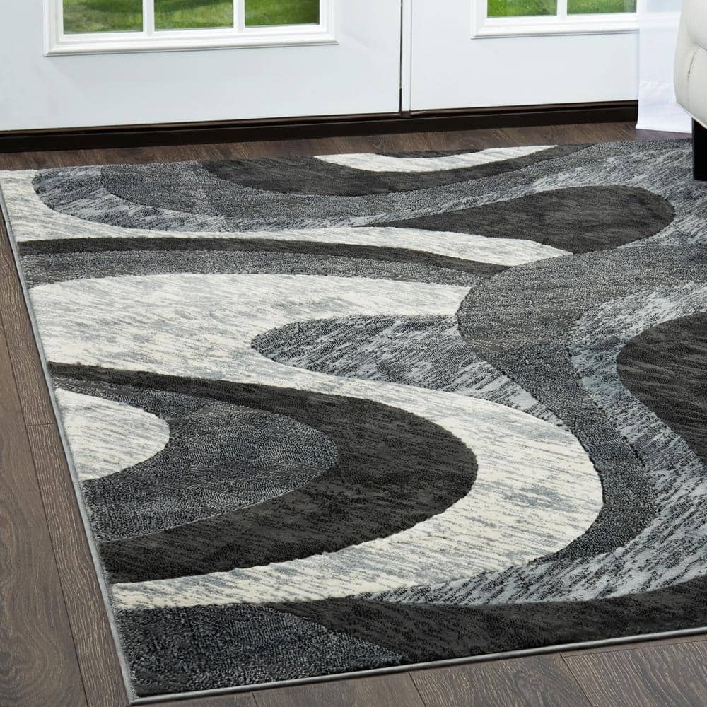Elegant Gray 40" Tufted Synthetic Area Rug with Abstract Swirl Design