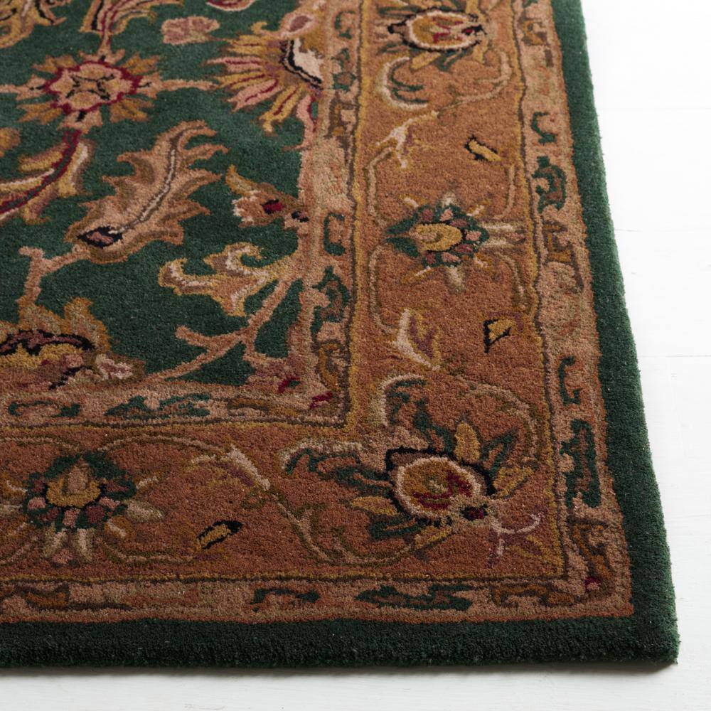 Handmade Oval Tufted Red Wool Rug 4' x 6'