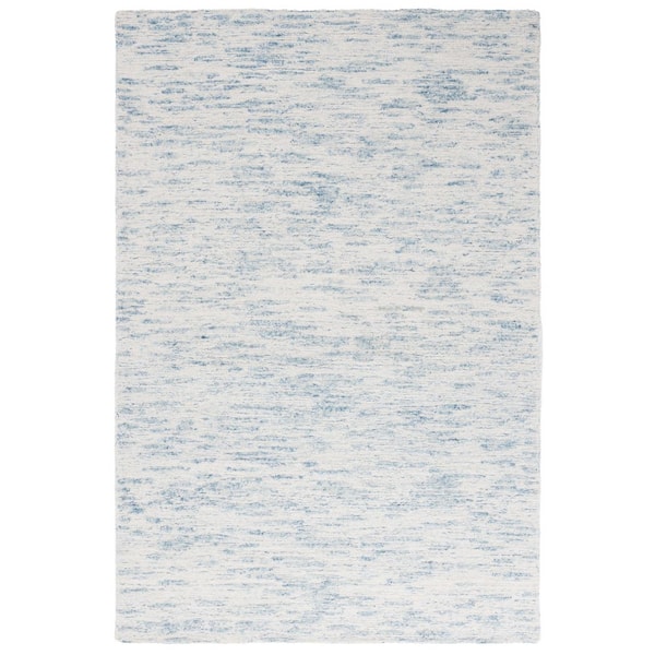 Ebony 8 ft. x 10 ft. Ivory/Light Blue Distressed Faded Area Rug