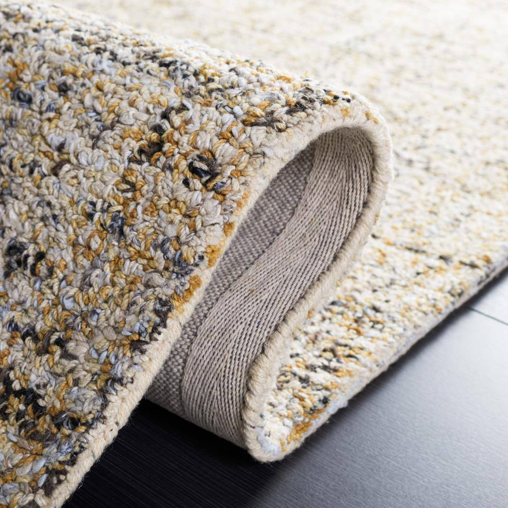 Beige and Gold Abstract Tufted Wool 8' x 10' Area Rug
