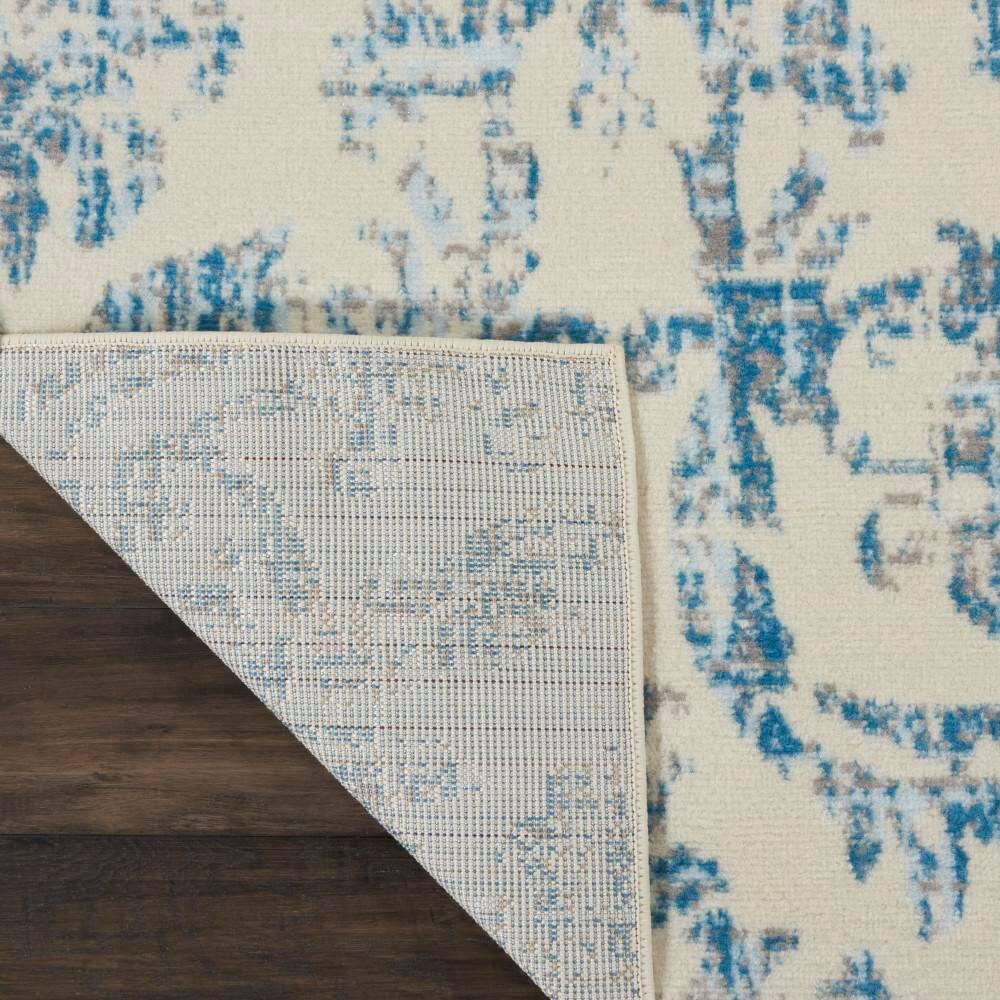 Elegant Ivory and Blue Damask 7' x 10' Synthetic Area Rug