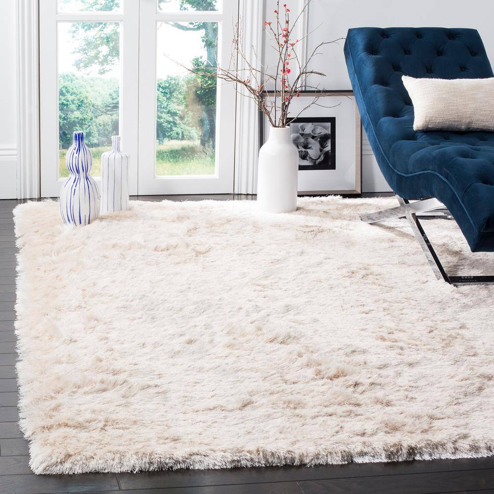 Ivory Tufted Shag 5' x 7' Wool and Synthetic Rug