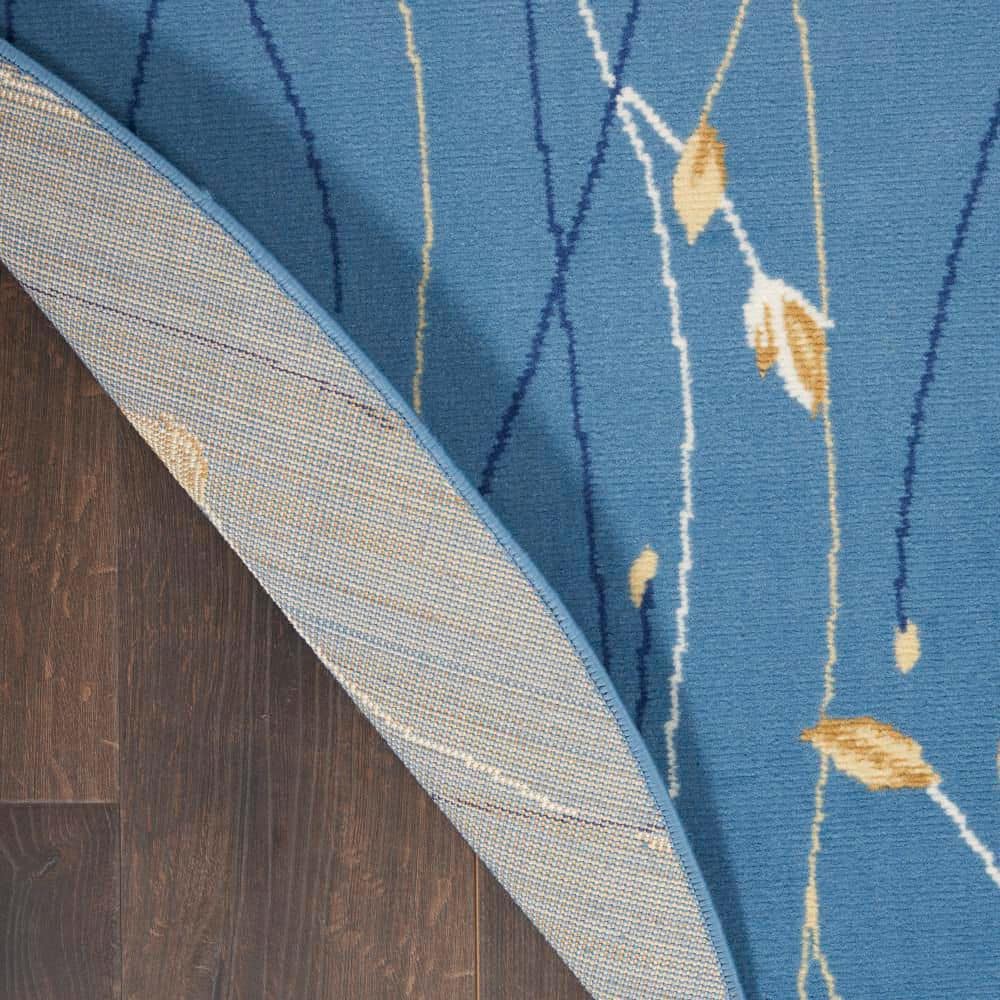 Light Blue Floral Round Synthetic Area Rug 5'3"