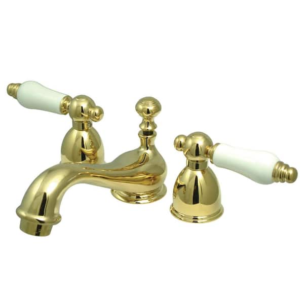 Kingston Brass Restoration 4 in. Centerset Double Handle Bathroom Faucet in Polished Brass