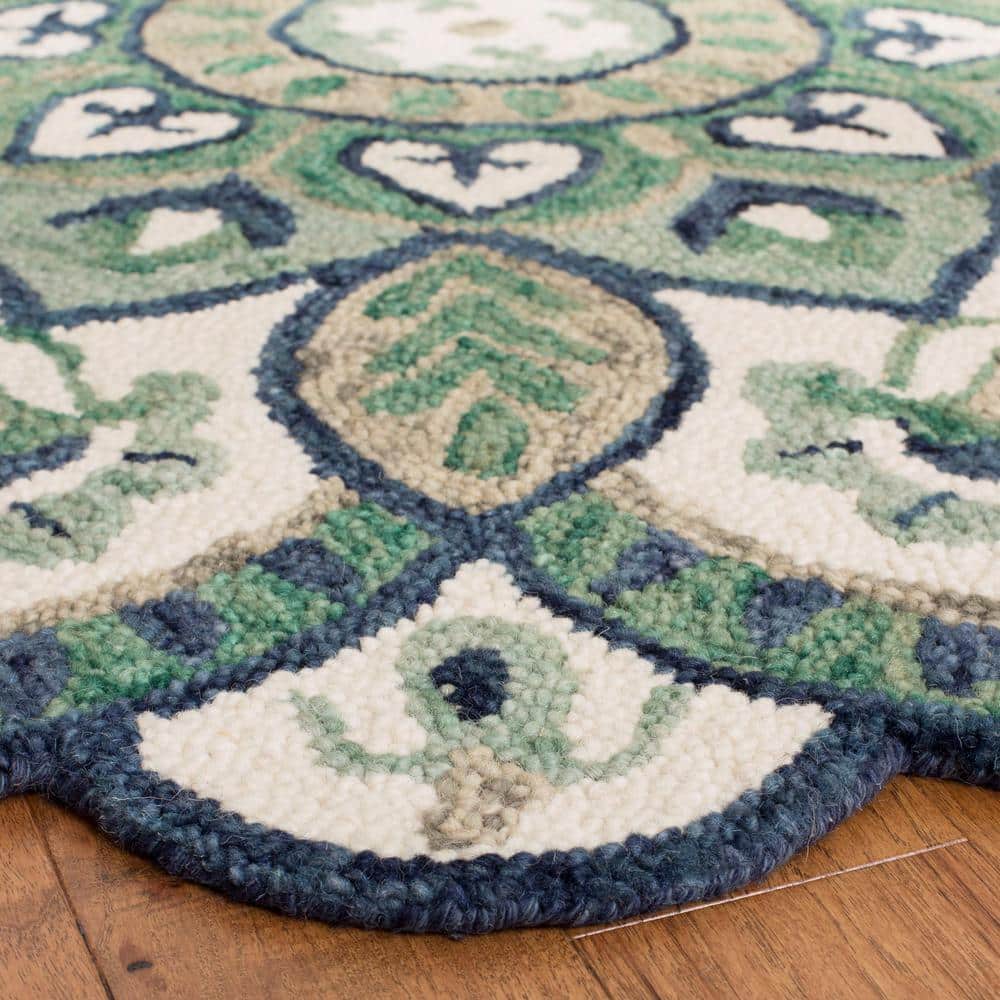 Handmade Ivory and Green Wool Round Tufted Area Rug