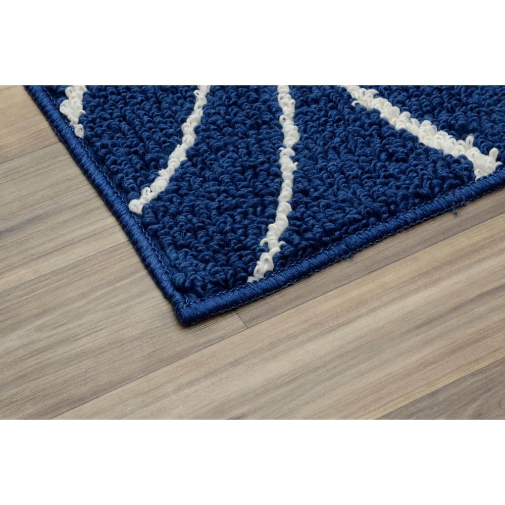 Indigo and Ivory Floral Synthetic 5' x 7' Area Rug