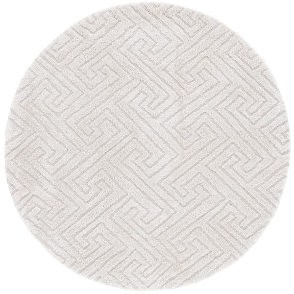 SAFAVIEH Tahoe Shag 7 ft. x 7 ft. Ivory Solid Geometric Round Area Rug