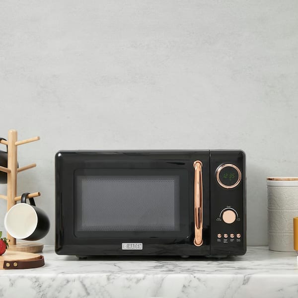 https://images.thdstatic.com/productImages/301f0462-78ed-4130-88c9-07ddb362c74d/svn/black-and-copper-haden-countertop-microwaves-75049-e1_600.jpg
