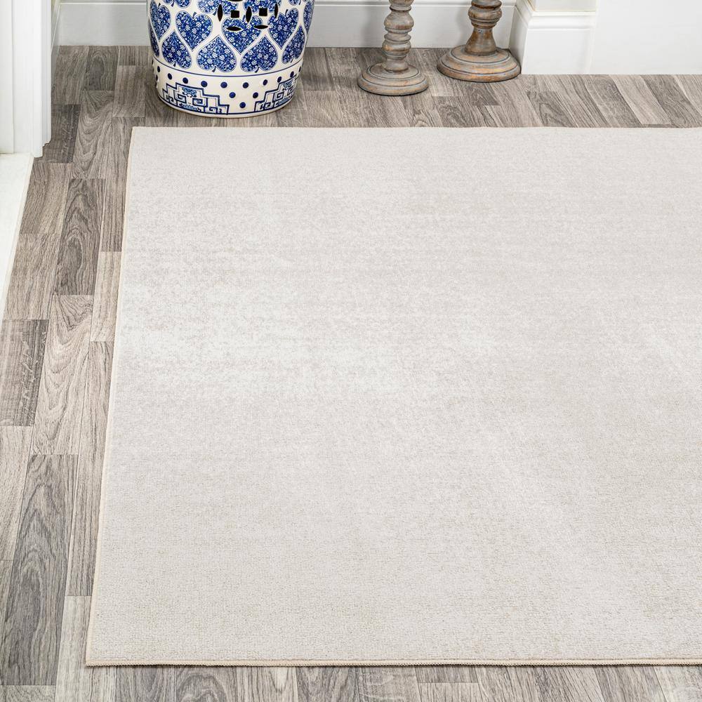 Cream 4' x 6' Synthetic Washable Rectangular Area Rug