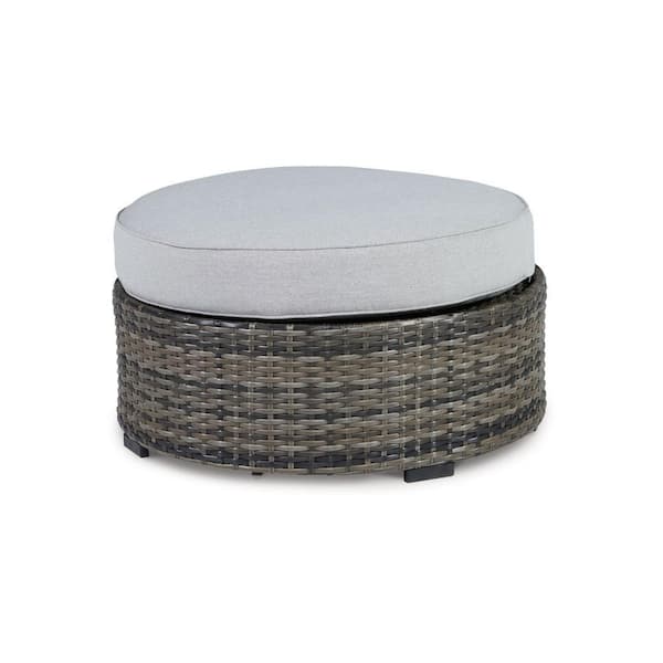 Benjara Saki Brown and Black Wicker Outdoor Ottoman with Light Gray Fabric CushionGuard Solid