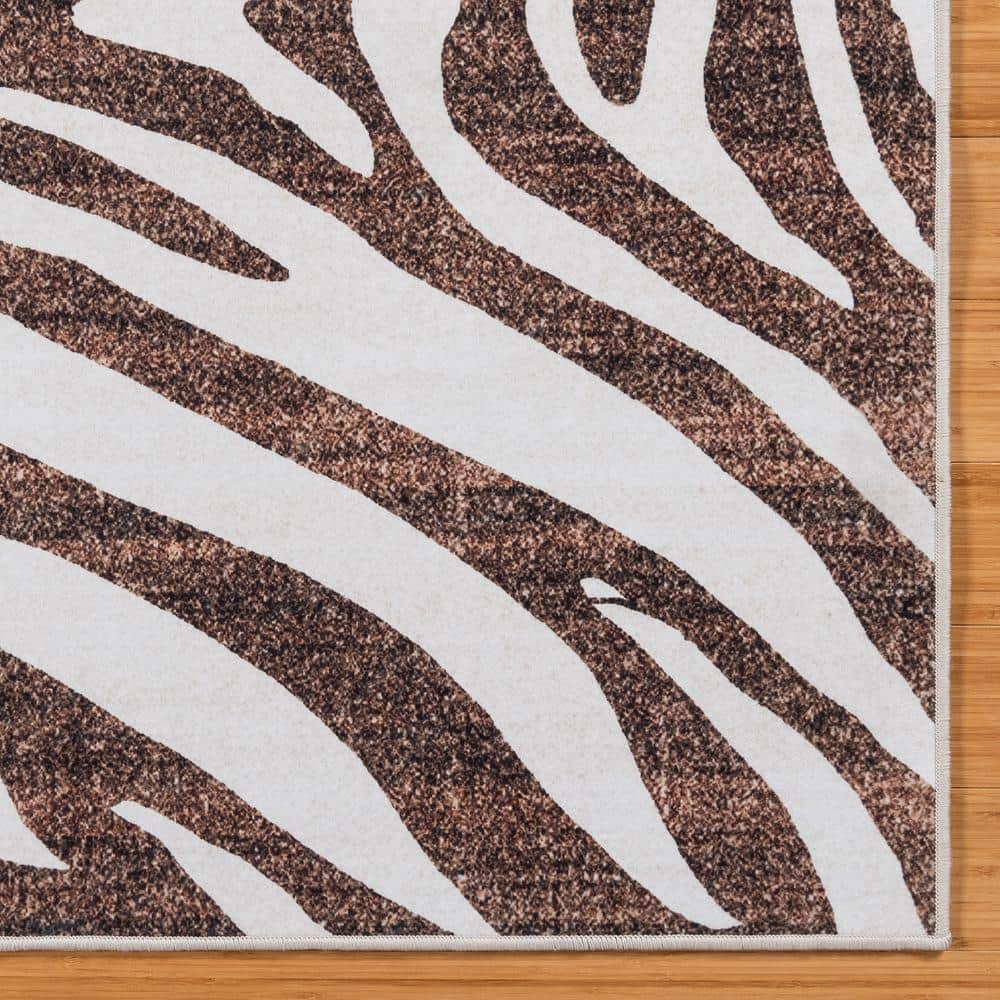 Ivory and Brown Zebra Print 8' x 10' Synthetic Area Rug