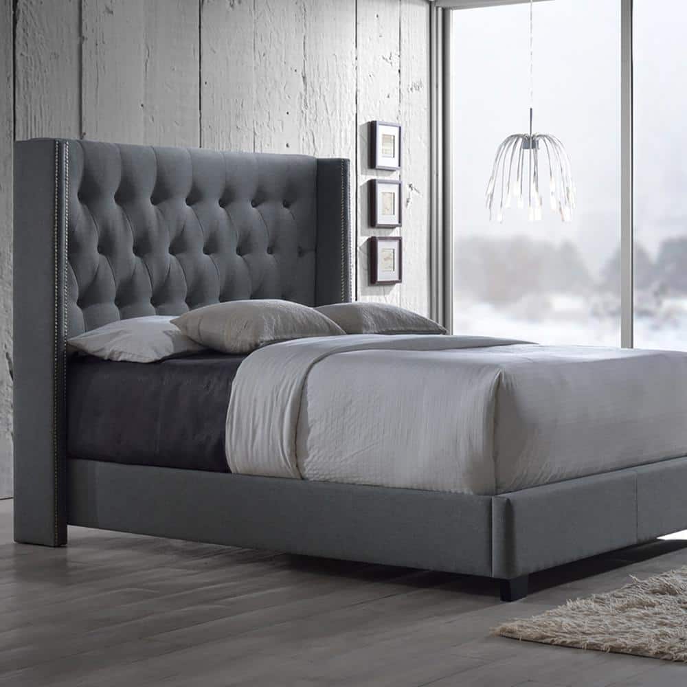 Luxurious King-Sized Gray Faux Leather Wingback Bed with Nailhead Trim