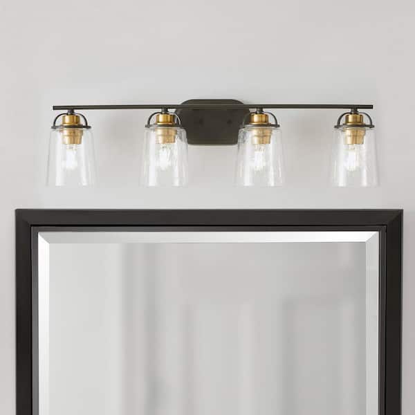 Home Decorators Collection Goddard 33.18 in. 4-Light Bronze Industrial Bathroom Vanity Light with Vintage Brass Accents and Clear Seeded Glass