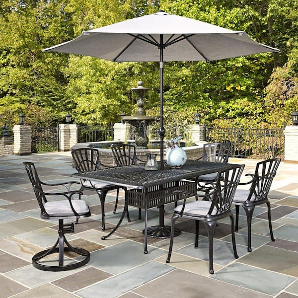 gray patio dining set with umbrella