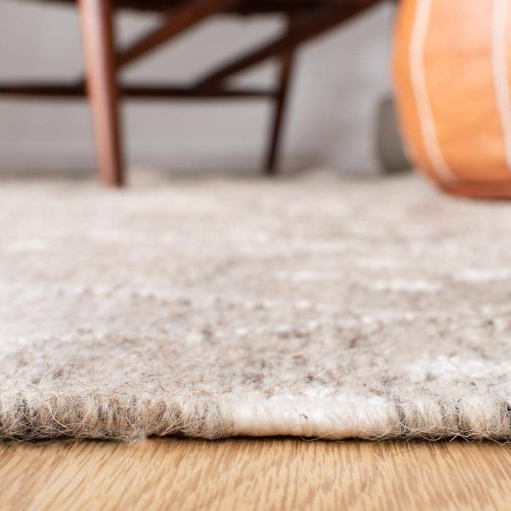 Natural Ivory 3' x 5' Handwoven Wool and Viscose Rug